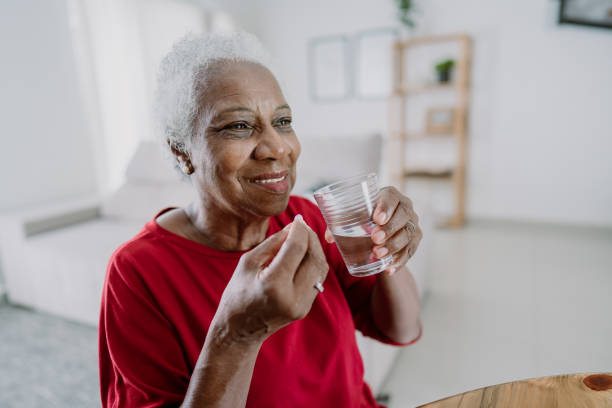 7,700+ Old Person Taking Medicine Stock Photos, Pictures & Royalty-Free Images - iStock